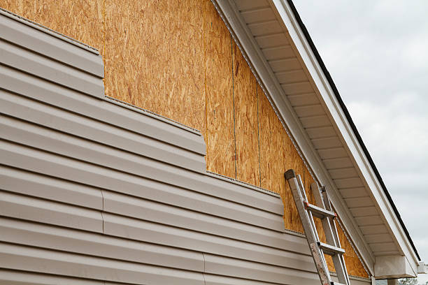 Professional Siding Installation technician working in Cocoa, FL